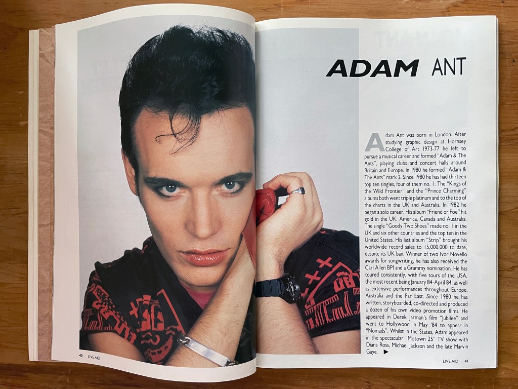 A double page spread with a photograph of a white man, and text to the right hand side.