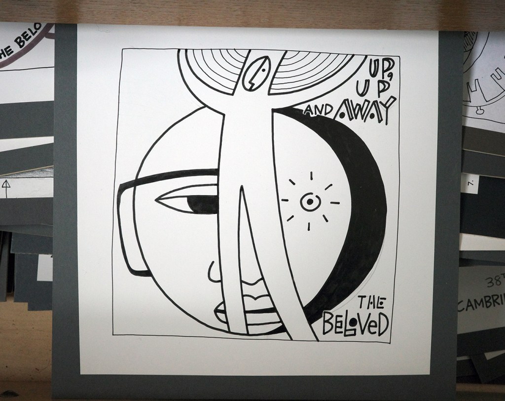 A black and white drawing of a figure in front of a face.